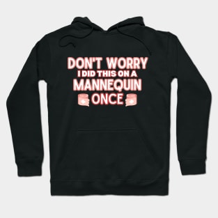 Funny Sarcastic Nursing Humor Attire Gift - 'Don't Worry I Did This on A Mannequin Once' - Hilarious Medical Staff Saying Funny Nurse Hoodie